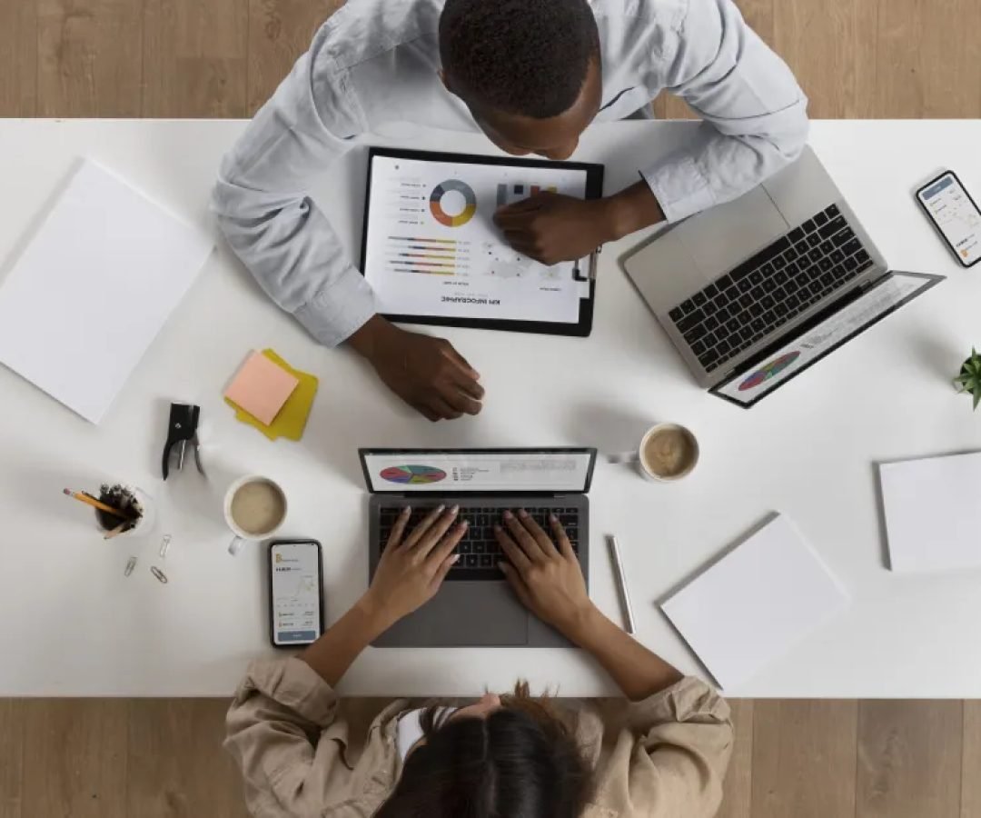flat-lay-people-working-together-office.jpg